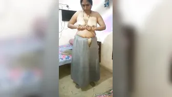 Married Bhabhi Peeling Off Her Clothes Revealing Sexy Curves