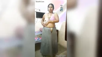 Married Bhabhi Peeling Off Her Clothes Revealing Sexy Curves