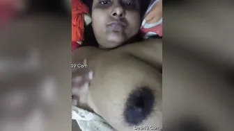 Horny Wife Playing With Her Huge Natural Tits In The Bedroom