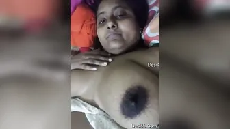 Horny Wife Playing With Her Huge Natural Tits In The Bedroom