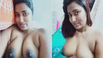 Naughty Wife Baring Her Breasts During Late Night Home Session