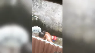 Village Babe Bathing Outdoors Completely Naked By The Well