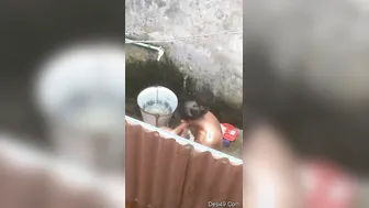 Village Babe Bathing Outdoors Completely Naked By The Well