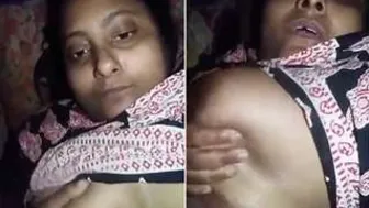 Horny Housewife Squeezing And Fondling Her Big Soft Boobs