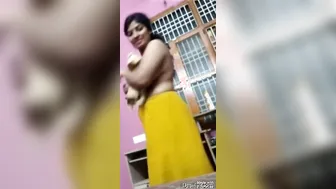 Sexy Bhabhi Putting On Her Bra Teasing In Front Of The Camera