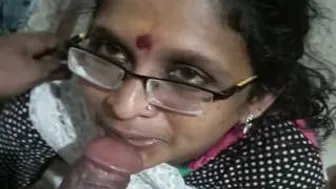 Mature Bhabi On Her Knees Sucking Dick Like A Hungry Slut