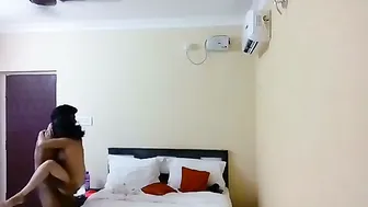 Young Couple Checking Into Cheap Hotel Room For Afternoon Session