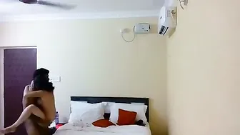 Young Couple Checking Into Cheap Hotel Room For Afternoon Session