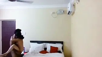 Young Couple Checking Into Cheap Hotel Room For Afternoon Session