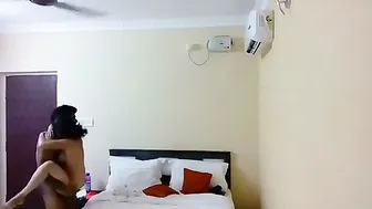 Young Couple Checking Into Cheap Hotel Room For Afternoon Session