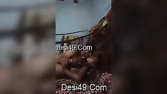 Village Couple Getting Intimate Under Blanket In Small Room