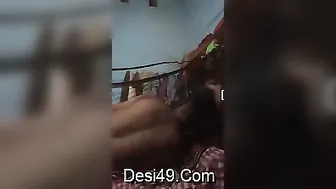 Village Couple Getting Intimate Under Blanket In Small Room