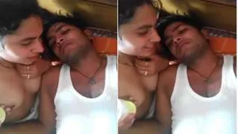 Lovers Kissing Passionately While He Sucks Her Boobs