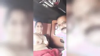 Desi Aunty Getting Her Boobs Sucked By Uncle Inside Parked Car