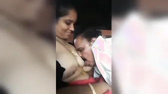 Desi Aunty Getting Her Boobs Sucked By Uncle Inside Parked Car