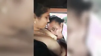 Desi Aunty Getting Her Boobs Sucked By Uncle Inside Parked Car