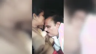 Desi Aunty Getting Her Boobs Sucked By Uncle Inside Parked Car