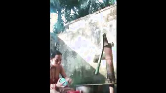 Village Aunty Bathing Outdoors Showing Off Her Natural Saggy Tits