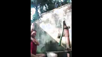 Village Aunty Bathing Outdoors Showing Off Her Natural Saggy Tits