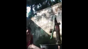 Village Aunty Bathing Outdoors Showing Off Her Natural Saggy Tits