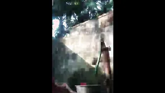 Village Aunty Bathing Outdoors Showing Her Natural Saggy Breasts