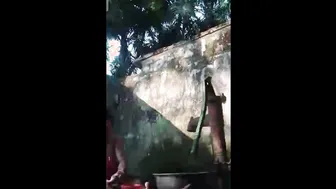 Village Aunty Bathing Outdoors Showing Her Natural Saggy Breasts