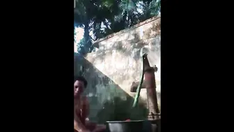 Village Aunty Bathing Outdoors Showing Her Natural Saggy Breasts