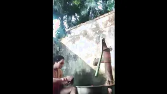 Village Aunty Bathing Outdoors Showing Her Natural Saggy Breasts
