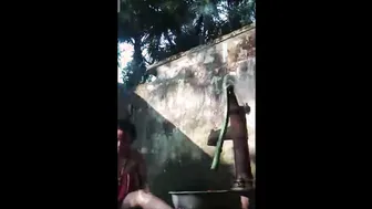 Village Aunty Bathing Outdoors Showing Her Natural Saggy Breasts