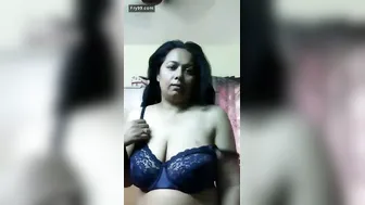 Horny Busty Indian Aunty Showing Off Her Massive Tits At Home