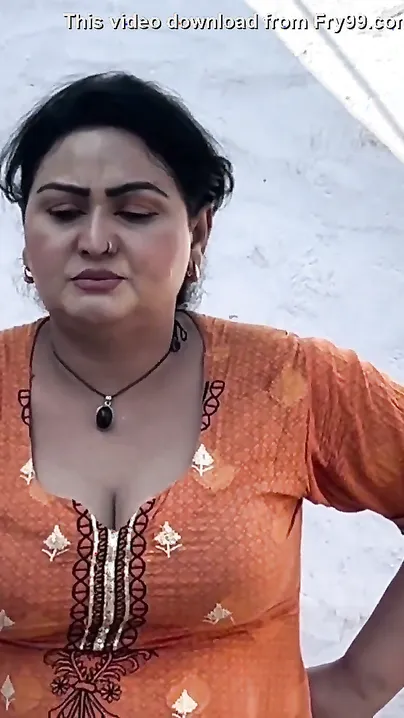 Pakistani Bhabhi Working Hard In Village Showing Curves In Tight Dress