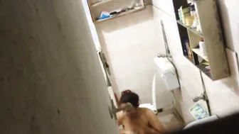 Catching My Curvy Aunty Bathing Through Hidden Camera Footage