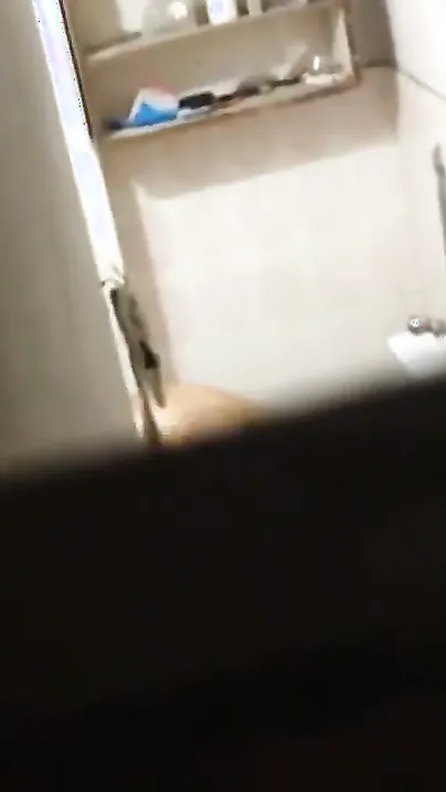 Catching My Curvy Aunty Bathing Through Hidden Camera Footage