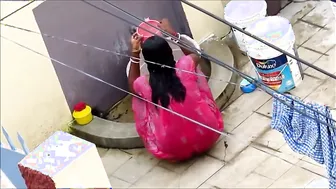 Aunty Bathing Outdoors In Red Nighty Getting All Wet For Me