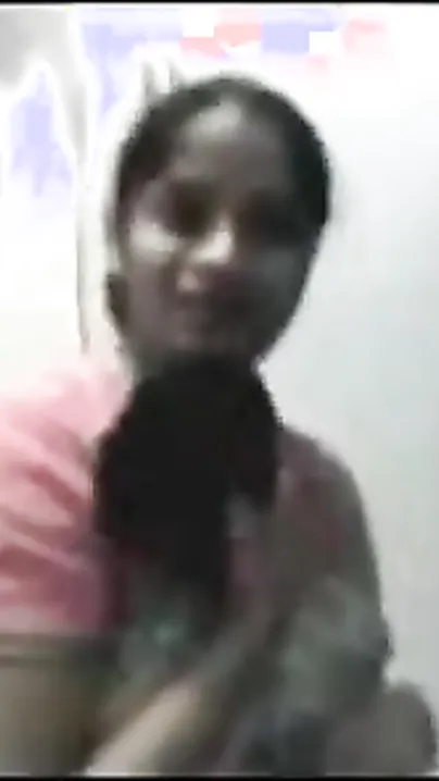 Bengali sex movie scene of a glamorous legal age teenager stripping for her lover on cam