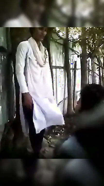Hidden web camera catches a lascivious college cutie giving a kiss and having outdoor fun