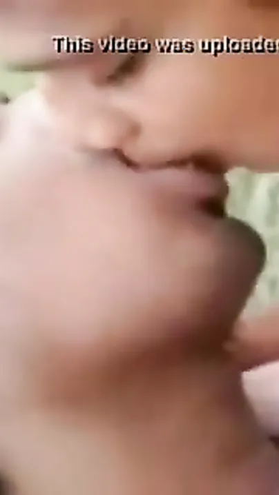 Young pair enjoying sexy outdoor joy in the park