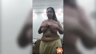 Busty Aunty In Glasses Stripping And Teasing Her Big Boobs