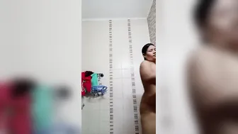 Busty Aunty Rubbing Oil On Her Huge Tits Fresh Out Of The Shower