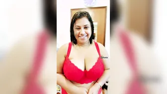 Busty Aunty Trying On Red Festive Bra Showing Off Her Curves
