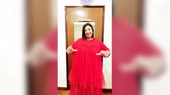 Busty Aunty Trying On Red Festive Bra Showing Off Her Curves