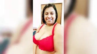 Busty Aunty Trying On Red Festive Bra Showing Off Her Curves