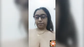 Busty Aunty In Glasses Stripping And Showing Her Goods On Camera