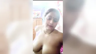 Busty Desi Aunty Exposing Her Huge Melons For The Camera Today