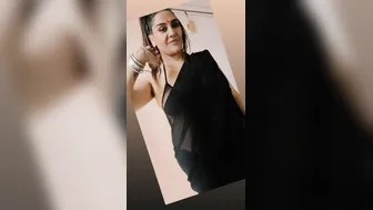 Chubby Nri Aunty Teasing In Black Net Saree Stripping Slowly