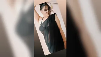 Chubby Nri Aunty Teasing In Black Net Saree Stripping Slowly