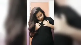 Chubby Babe Flaunting Her Huge Milk Tanks For The Camera