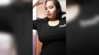 Chubby Babe Flaunting Her Huge Milk Tanks For The Camera