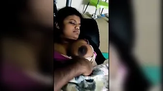 Busty Babe Showing Off Her Huge Natural Tits On Camera