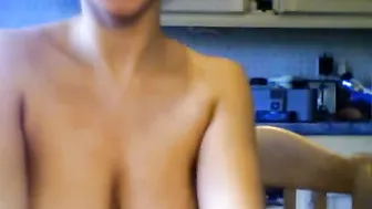 Babe In Glasses Stripping Naked And Playing With Her Big Tits